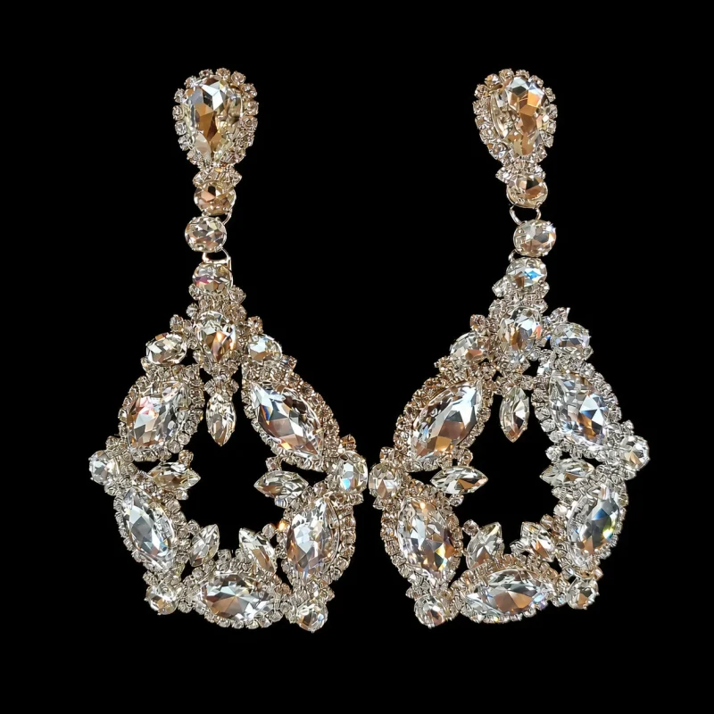 Arione DeCardeza’s Banter crystal jewelry on a black studio background