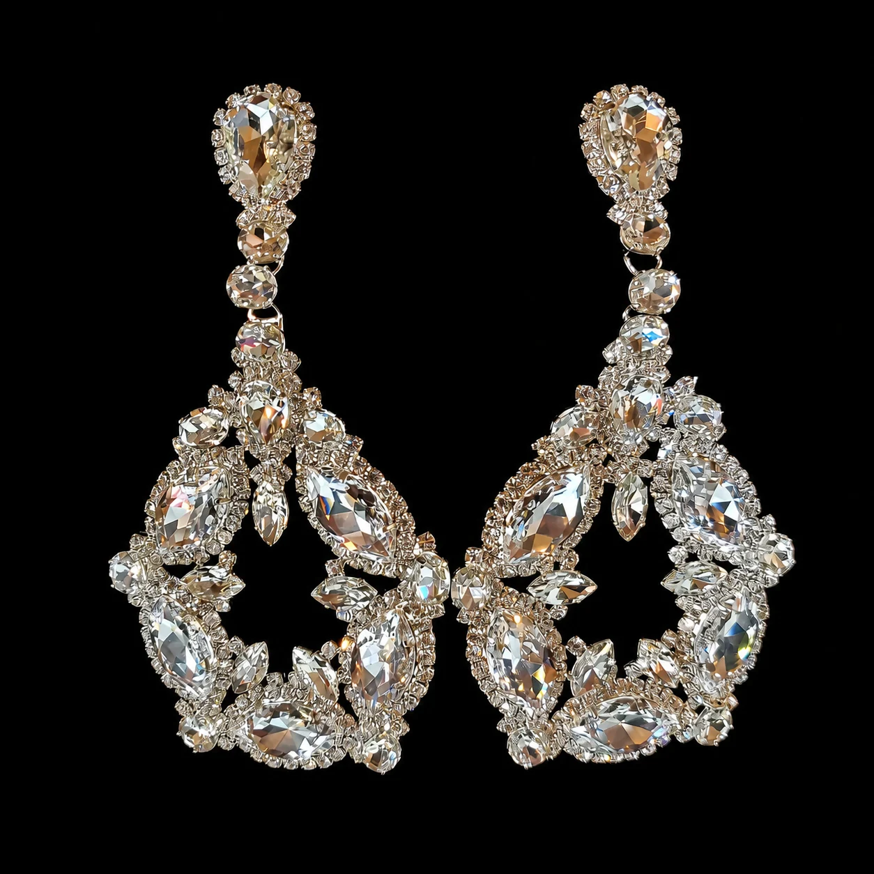 Arione DeCardeza’s Banter crystal jewelry on a black studio background