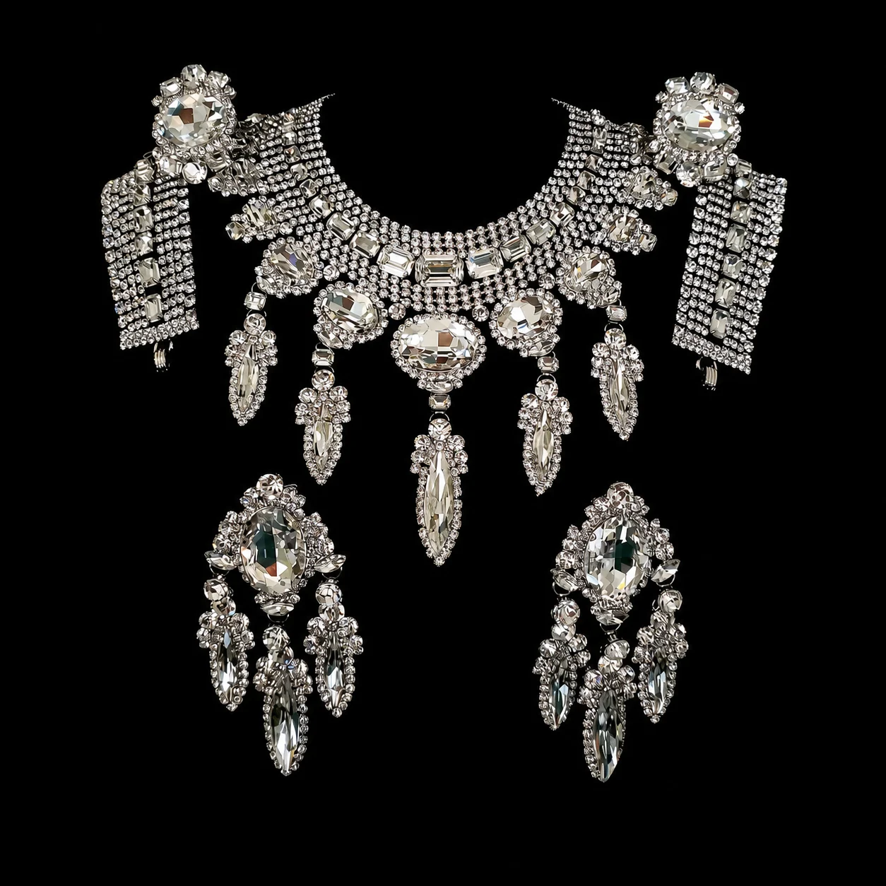 Dragon Lady’s Perfection crystal jewelry on a black studio background