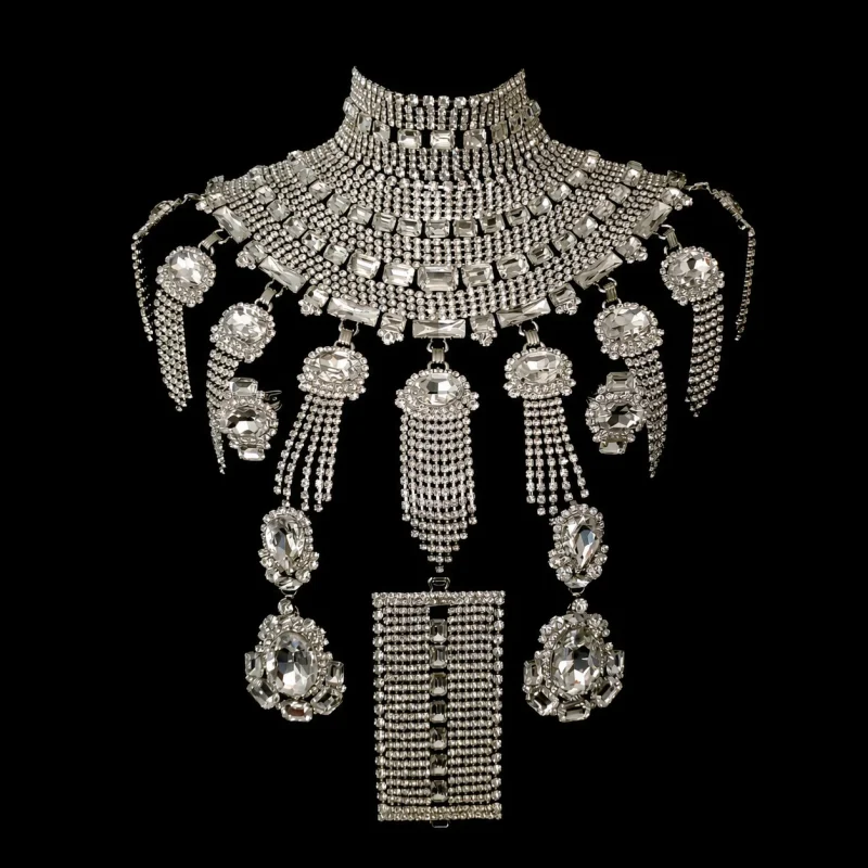 Kir Royal’s Elegance crystal jewelry on a black studio background
