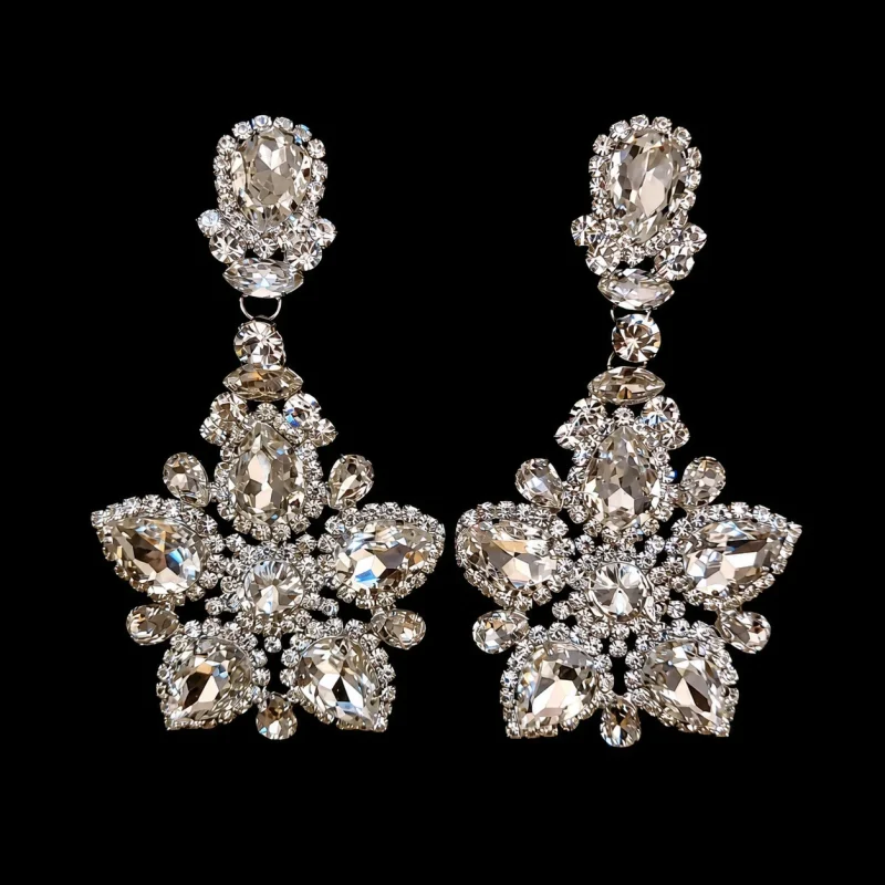 Vega Starr’s Joy crystal jewelry on a black studio background